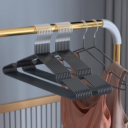 This durable metal clothes hanger features a slim design to maximize closet space and a non-slip surface to keep clothes securely in place. Perfect for hanging a variety of clothing items, it’s a practical addition to any wardrobe.