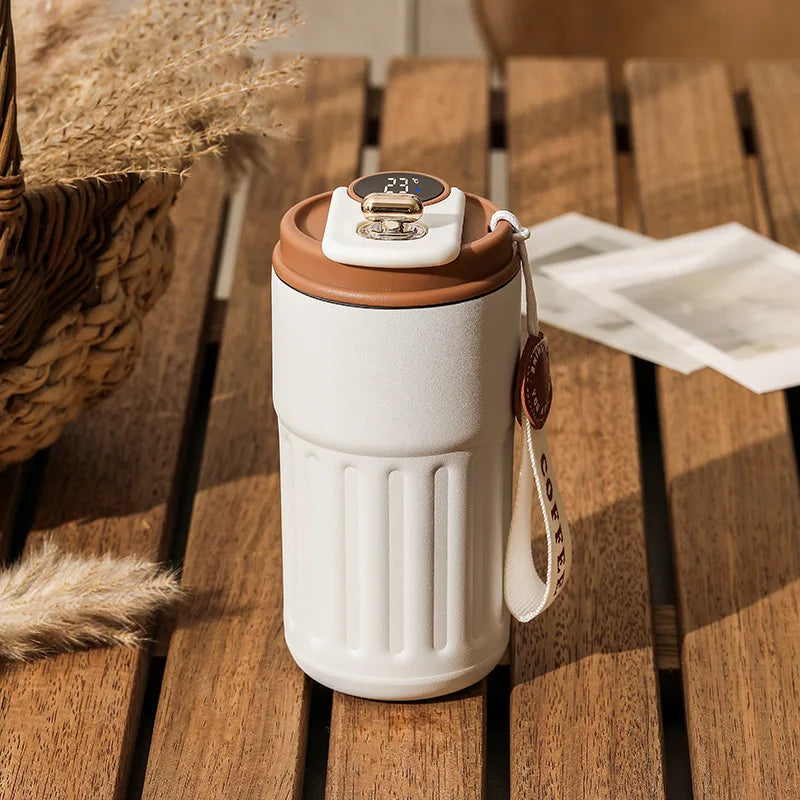 This high-quality stainless steel vacuum thermos flask offers excellent insulation to keep drinks hot or cold. With a straight cup design, it provides easy handling and pouring while ensuring long-lasting performance and resistance to corrosion.