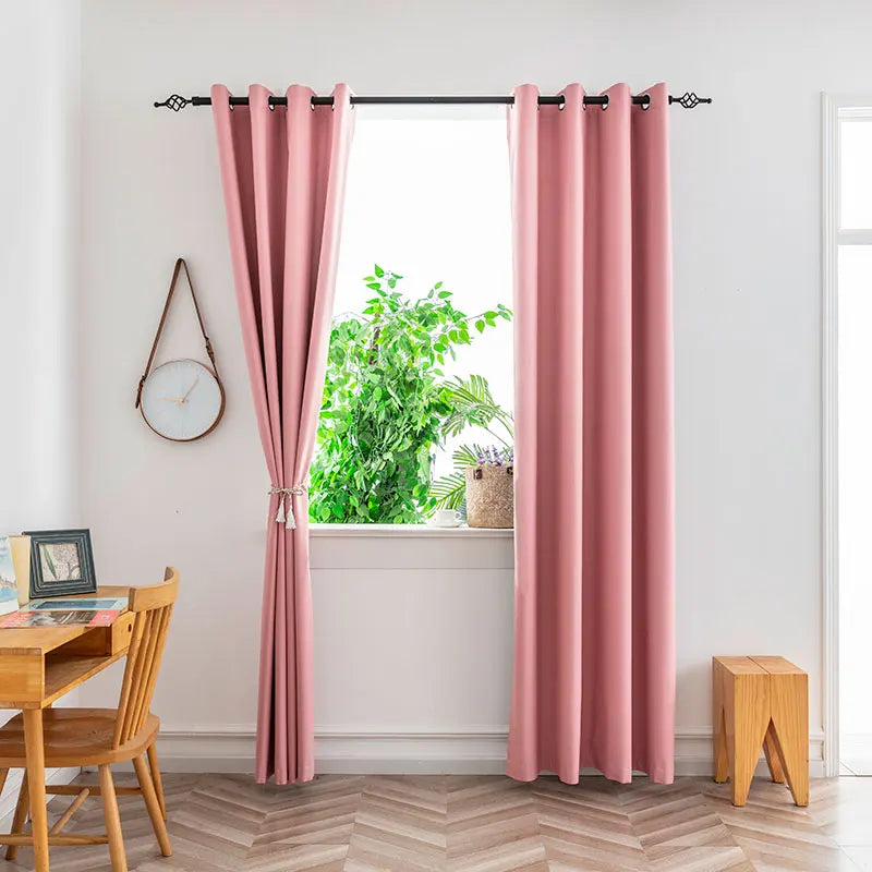 This blackout curtain features a high-quality polyester material with a blackout coating to block sunlight and ensure maximum darkness. Its versatile design offers privacy and energy efficiency, making it ideal for light-sensitive spaces.