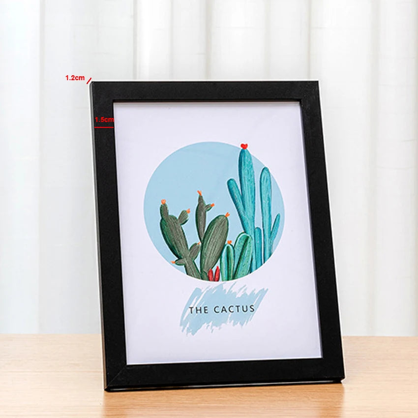 "Showcase your favorite memories with this minimalist wooden photo frame, crafted from durable wood for a natural look. Its versatile rectangular design is perfect for both portrait and landscape displays."