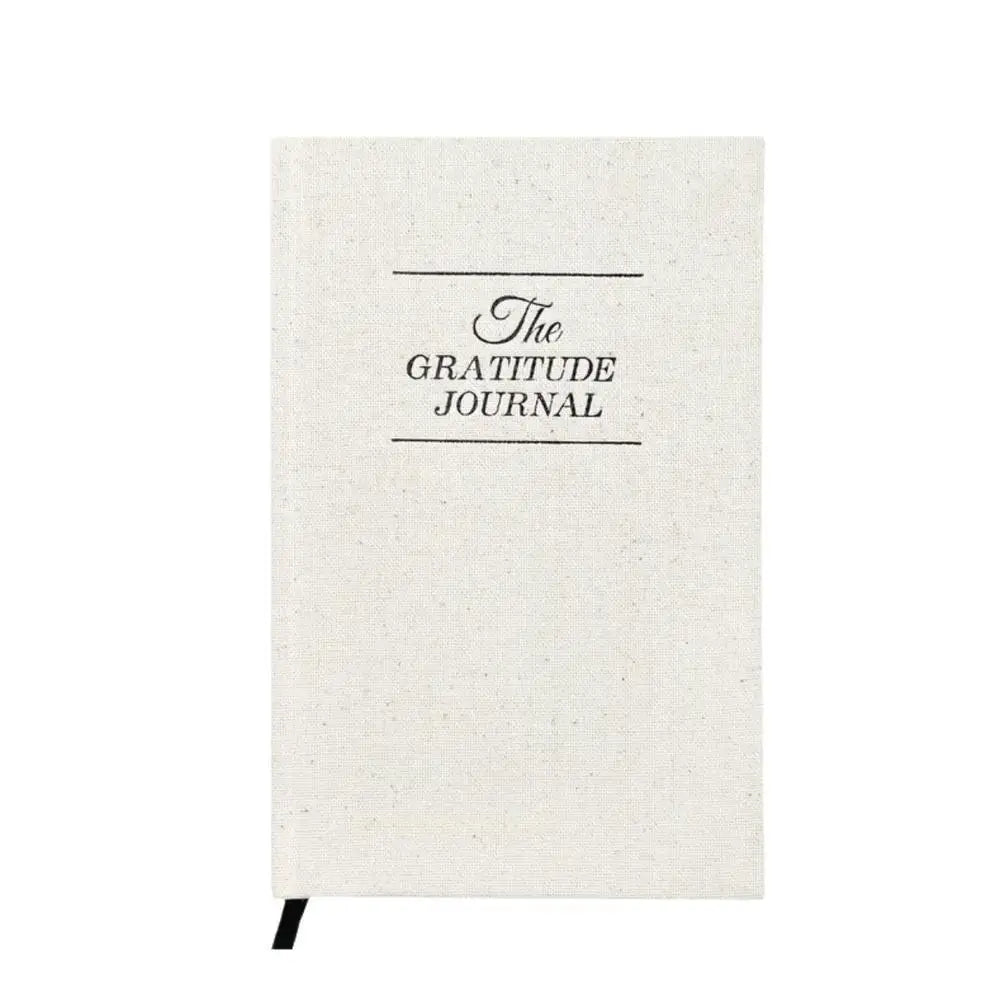 "Embrace positivity with this six-month gratitude journal, featuring daily prompts for reflection and affirmations. Luxuriously designed with a linen hardcover, thick paper, and a handy back pocket, it's perfect for fostering happiness and mindfulness."